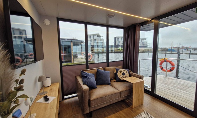 Wendtorf Boat Rental | Houseboat Fjord Cumulus with bio sauna and roof terrace in Wendtorf/Kiel Fjord