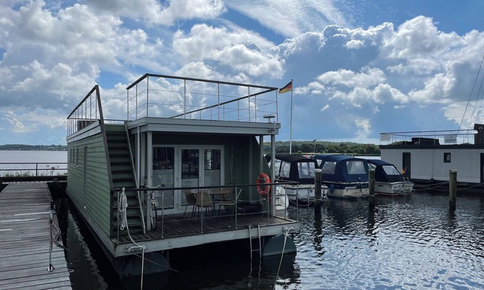 Schleswig Boat Rental | Houseboat Walfisch for 5 pers, with roof terrace in Schleswig