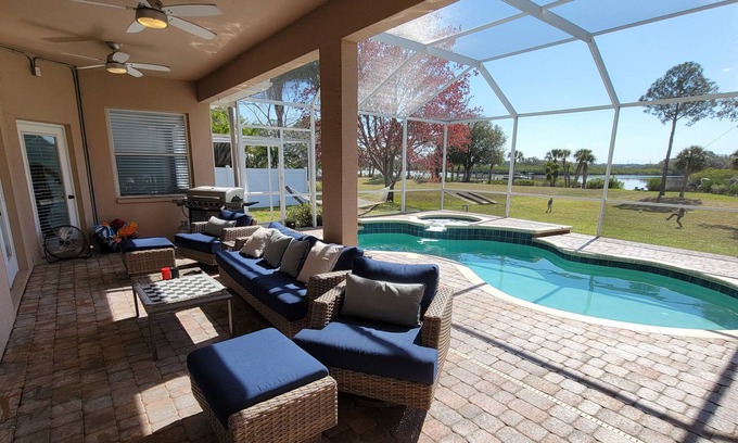 Tarpon Springs House | Huge Riverfront Home! Heated pool, Jacuzzi, and Kayaks Included!