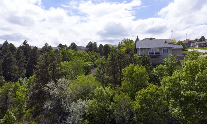 Rapid City House | Immaculate modern home with stunning views nestled into a beautiful valley.