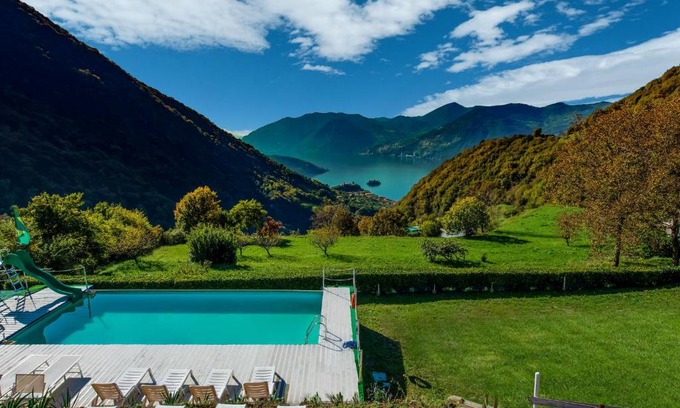 Marone Ski Chalet | In a green and relaxing atmosphere with pool and stunning lake view