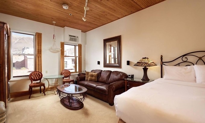 Downtown Hotel | Independence Square Unit 306 | Hotel Room with Large Sitting Area & Wet Bar