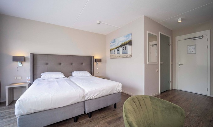 Westkapelle Hotel | Inviting Room with Beach Access, Pool, and Onsite Dining for a Relaxing Stay