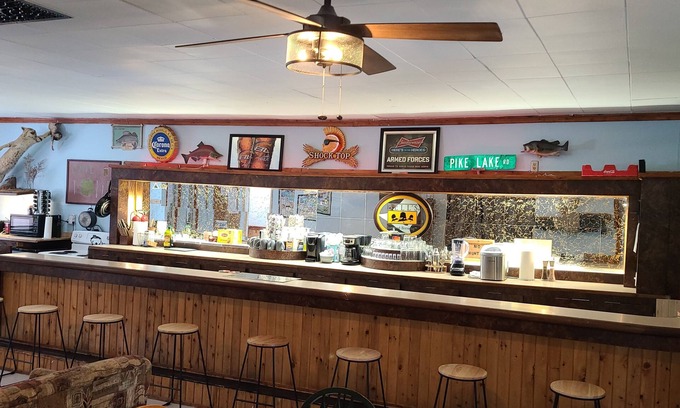 Toivola House | Jake's Bed & Bar 3BR, 7 beds, SXS Snowmobile Trail Access, Fire Pit, Grill, Wifi