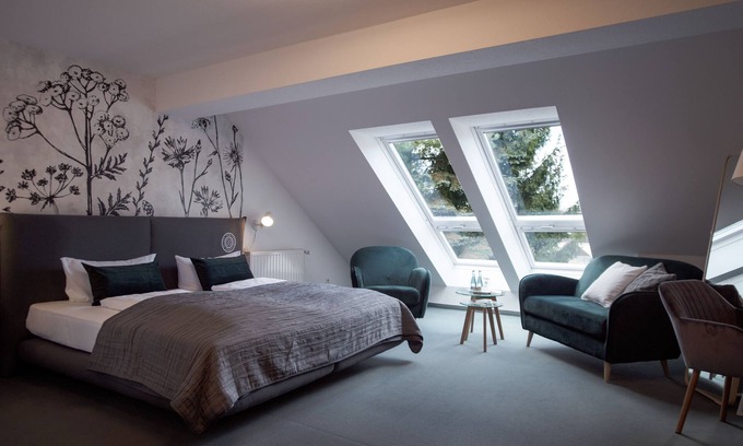 Alt-Ruppin Apartment | Juniorsuite mit Gartenblick