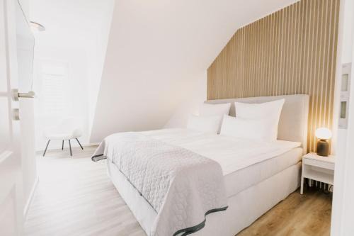 Greetsiel Apartment | Küsten Suite de See - Suite 2 direkte Deichlage, Balkon, 77qm