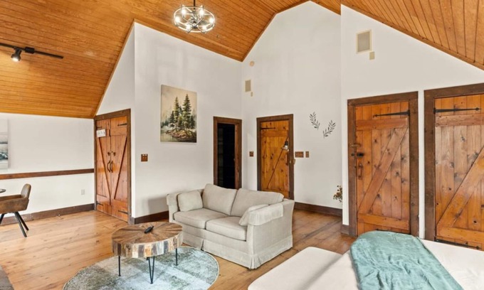Townsend Hotel | King Suite w/Skylights | Sofa Lounge | Balcony + Trees