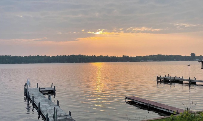 Oscoda House | Lake house paradise w/boat dock, fire pit, and close to trailhead