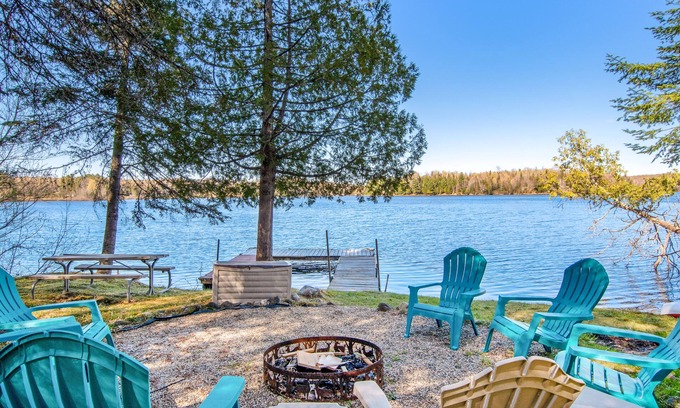 Presque Isle Cabin | Lakefront Getaway W/ Firepit, Free WiFi, Dock, & Large Deck - Dogs Welcome