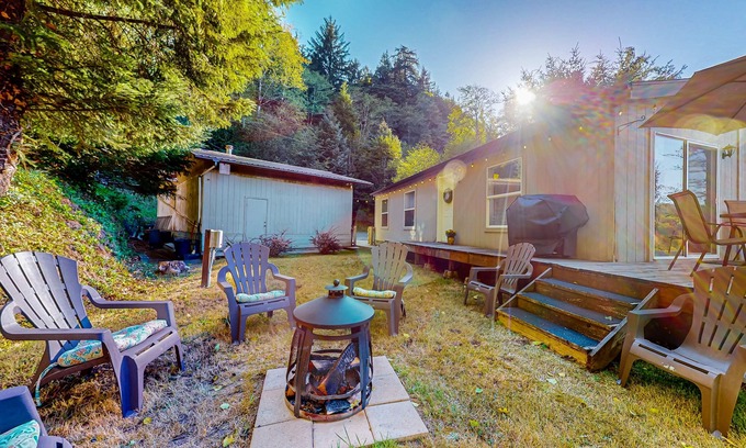 Lakeside House | Lakefront home with water/dune access, deck, grill, firepit, dock, & W/D