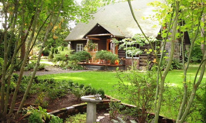 Marmot Cabin | Log cabin, private, hottub, sauna, spa, gardens, featured in national magazine.
