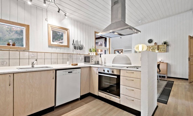Vejers House | Look forward to an enjoyable vacation in this attractive vacation home with indoor pool.