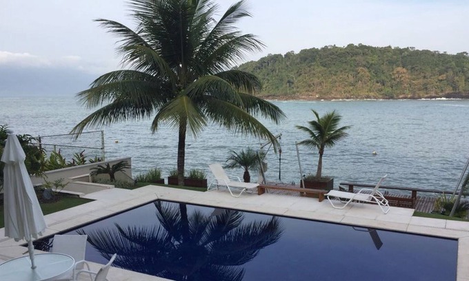 Conceicao de Jacarei House | Luxurious house with 6 suites, beach, natural pool, motorboat at the door ...