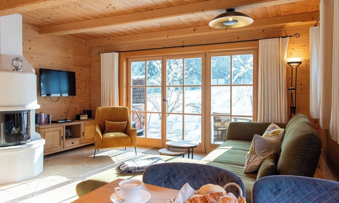 Ruhpolding Apartment | Luxury chalet category 1, 85sqm, 2 bedrooms, 2 bathrooms, fireplace, terrace with Jacuzzi