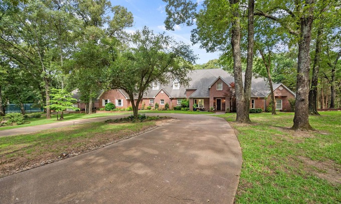 Athens House | Luxury home on 27 wooded acres with two private lakes in Athens, Texas.