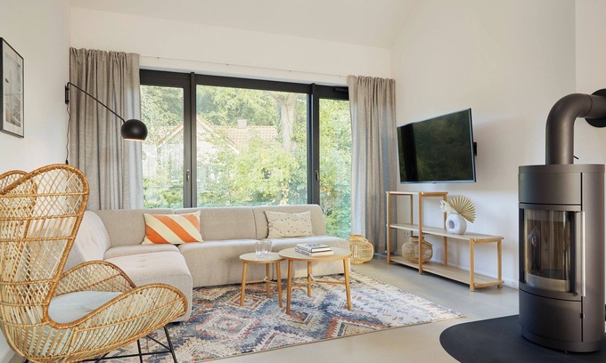 Hohwacht Apartment | Luxury loft apartment with rooftop terrace and fireplace.