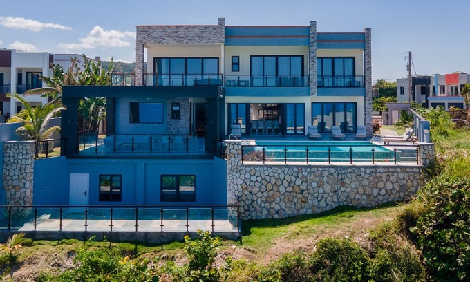 Tower Isle Villa | Luxury Oceanfront Villa~ Fully Staffed~Pool~Jacuzzi~Movie Theatre