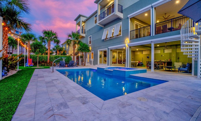 Marathon House | Luxury Retreat w/Pool, Spa, 100’ Dock, Games & More!