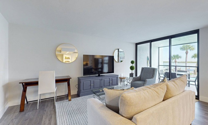 Marco Island Condo | Luxury waterfront condo with shared pool, hot tub, and a tennis court