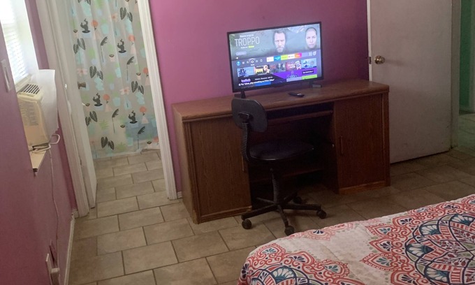 Northwest Pensacola House | Main Bedroom at Rainbow's End