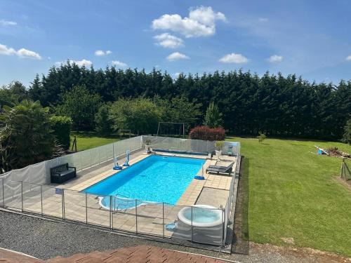 Crouay House | Maison avec piscine chauffée, plages du débarquement