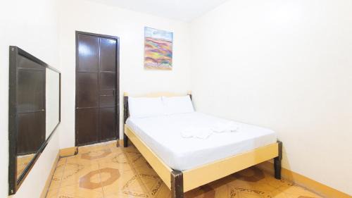 Tarlac Hotel | Maliwalo Inn Tarlac by RedDoorz