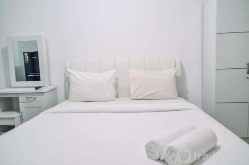 South Tangerang Apartment | Minimalist Studio Room at Urbantown Serpong Apartment By Travelio