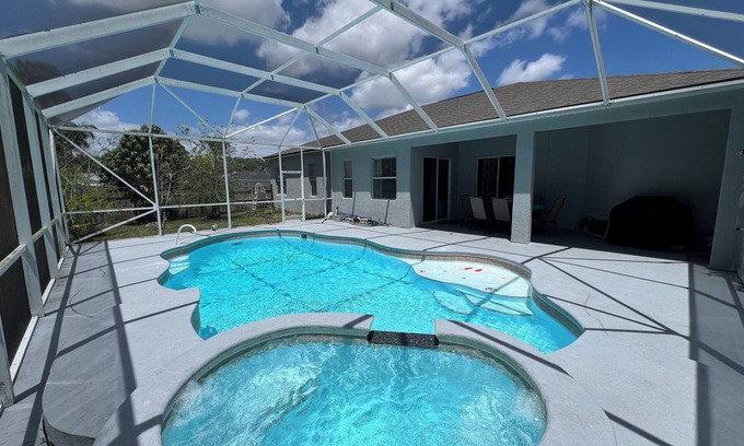 Cocoa House | Modern and spacious getaway with a pool and grill