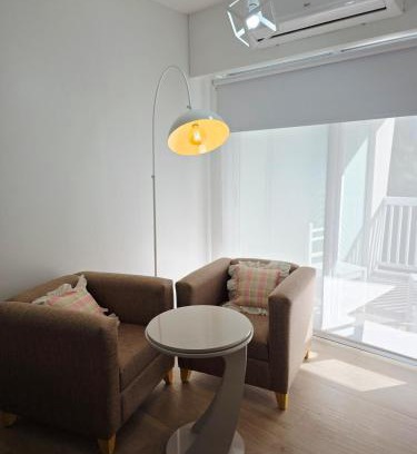 Constitucion Apartment | Modern apartment with a balcony and a heated pool