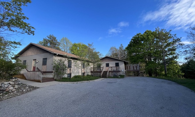 Charlevoix House | Modern, Huge, Hot Tub, Game Room! <1 mile from Lk Michigan, ADA & kid friendly!