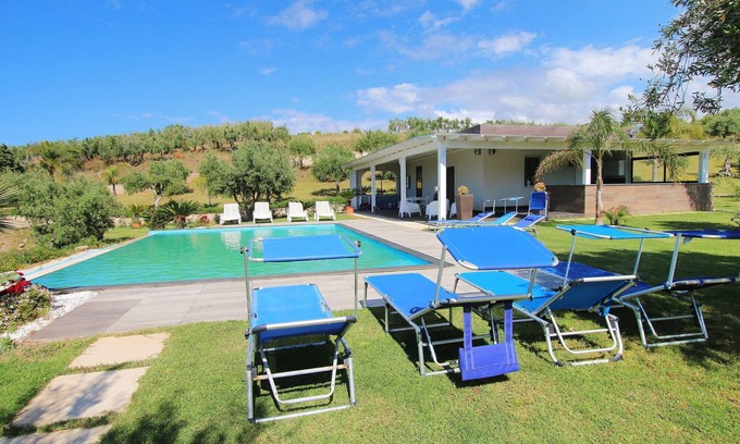 Campofelice di Roccella Villa | Modern property with Private Golf Practice, Private Pool, Garden, WiFi, Sea VIew