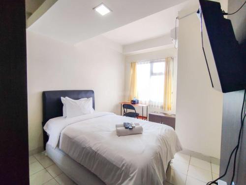 Cileunyi Apartment | Modern Studio Design at Harvard Jatinangor Apartment By Travelio