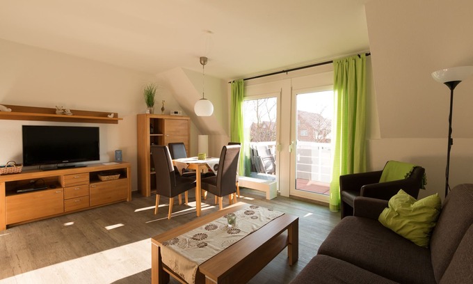 Norddeich Apartment | Moderne Og-wohnung mit Süd-west Balkon- 40 m² bis zu 4 Pers