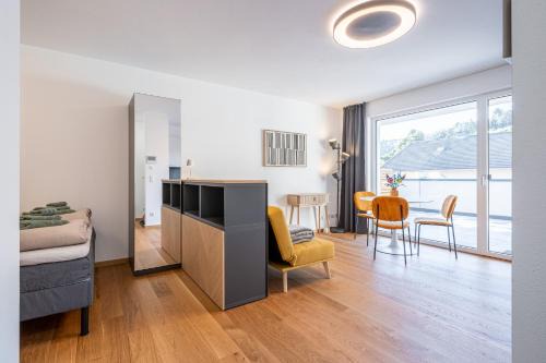 Telfs Apartment | Modernes Studio mit sonniger Dachterrasse