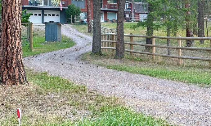 Kings Point Apartment | Montana Forest Retreat, Easy Walk to Flathead Lake, 1.5 Acres Fenced for Dogs!