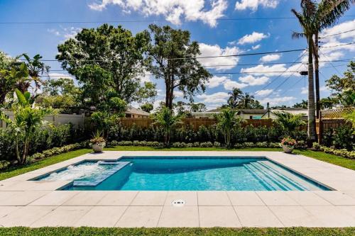 Naples Park House | Naples Beach Retreat Bike to Beach! 4 Bed 2 Bath