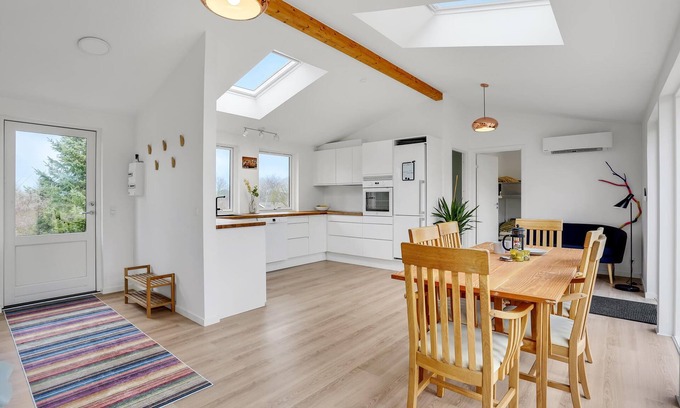Togeholt House | Near Bønsvig beach, this cozy and modern cottage with a beautiful terrace welcomes you.