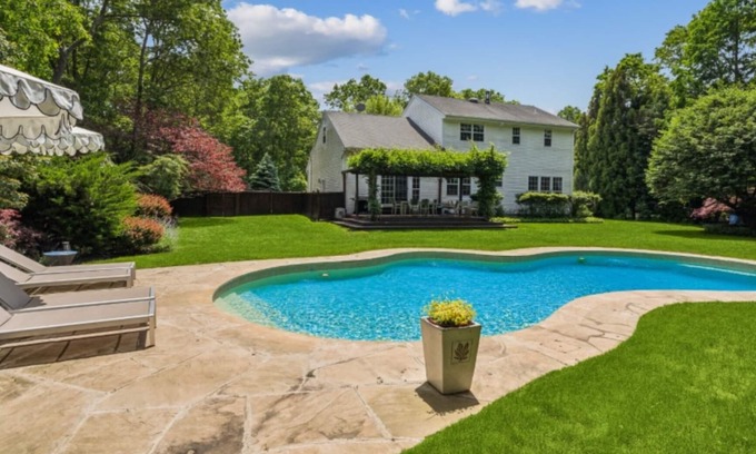 Westhampton House | NEW DECK! Private 1 Acre Family Friendly Home - Heated Pool, Home Office & Gym