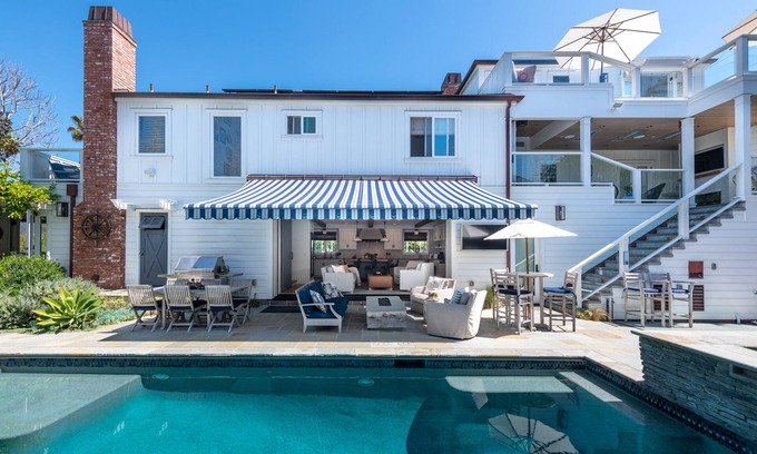 The Strand House | New Luxury Home on Double-Lot w/Heated Pool, Spa & Yard, Easy Stroll to Beach