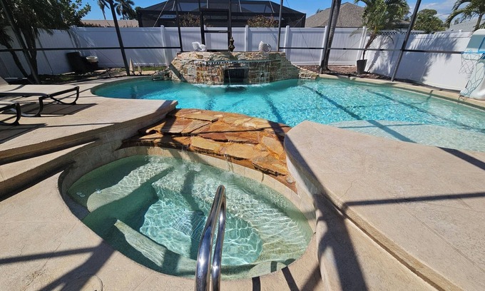 Naples Park House | NEW! Serene House with Spectacular Heated Pool/Spa, FREE Bikes, Amenities, Beach