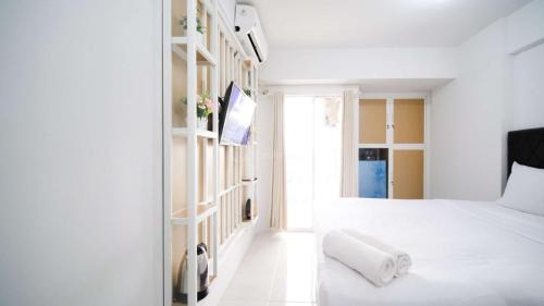 Sidoarjo Apartment | New Studio Apartment with Strategic Location at Suncity Residence By Travelio