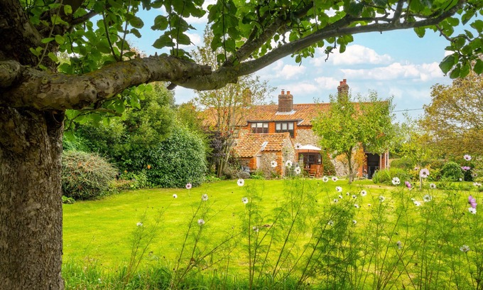 Sharrington Cottage | Newly renovated Brick & Flint cottage with stylish interiors, wood burning stove, beautiful garden,
