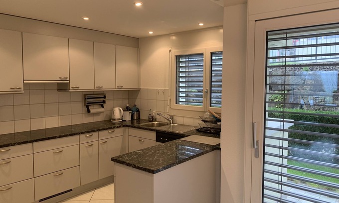 Hunenberg Apartment | Nice apartment with garden and view on the mountains , farms and hills.