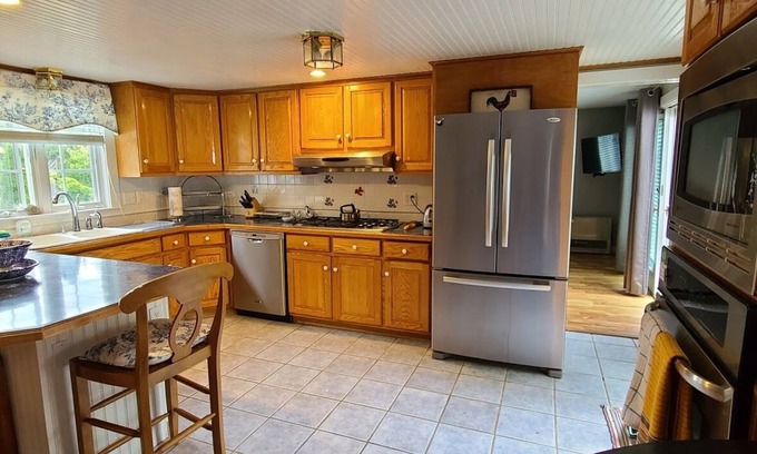Oak Bluffs House | Nice home w outdoor patio bar , dining table, comfortable furniture See photo
