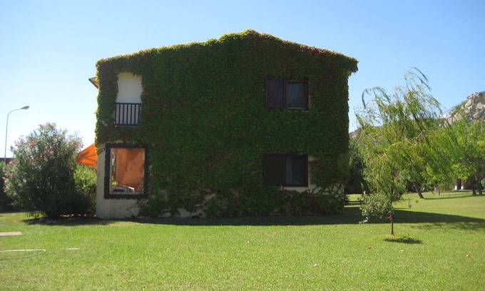 Arzachena Apartment | Nice three-room apartment surrounded by greenery and sea view