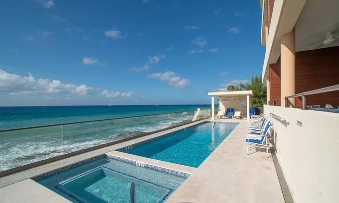 Northwest Point Apartment | Oceanfront with 7 mile beach views, Ground-Floor, Pool, Sleeps 6