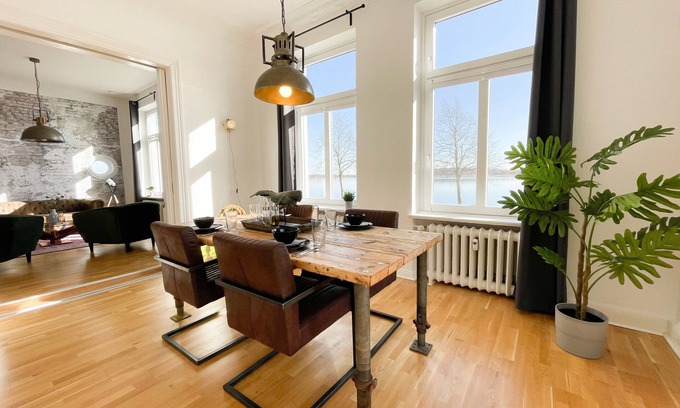 Schleswig Apartment | Old apartment with panoramic view of the Schlei, balcony and fireplace in the heart of Schleswig