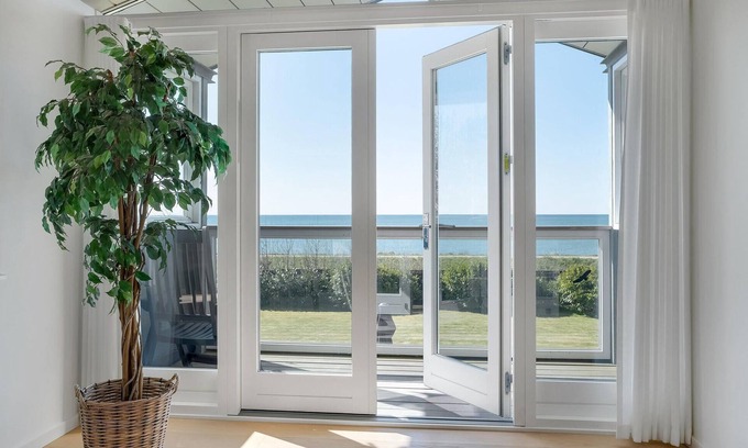 Dannemare House | On the south coast of Lolland, this fantastic vacation home with sea views welcomes you.