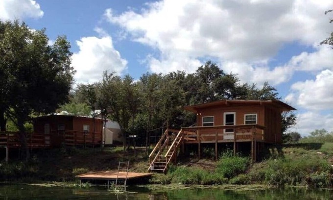 Mertzon Cabin | Our cabins are located on the crystal clear water of Spring Creek.