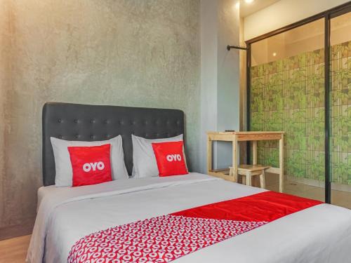 South Tangerang Hotel | OYO 90305 De Umbrela Mansion Syari'ah Ciputat